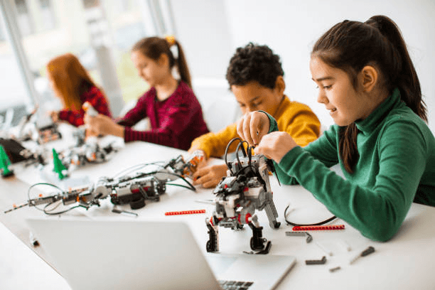 Students learning robotics with RoboCoders