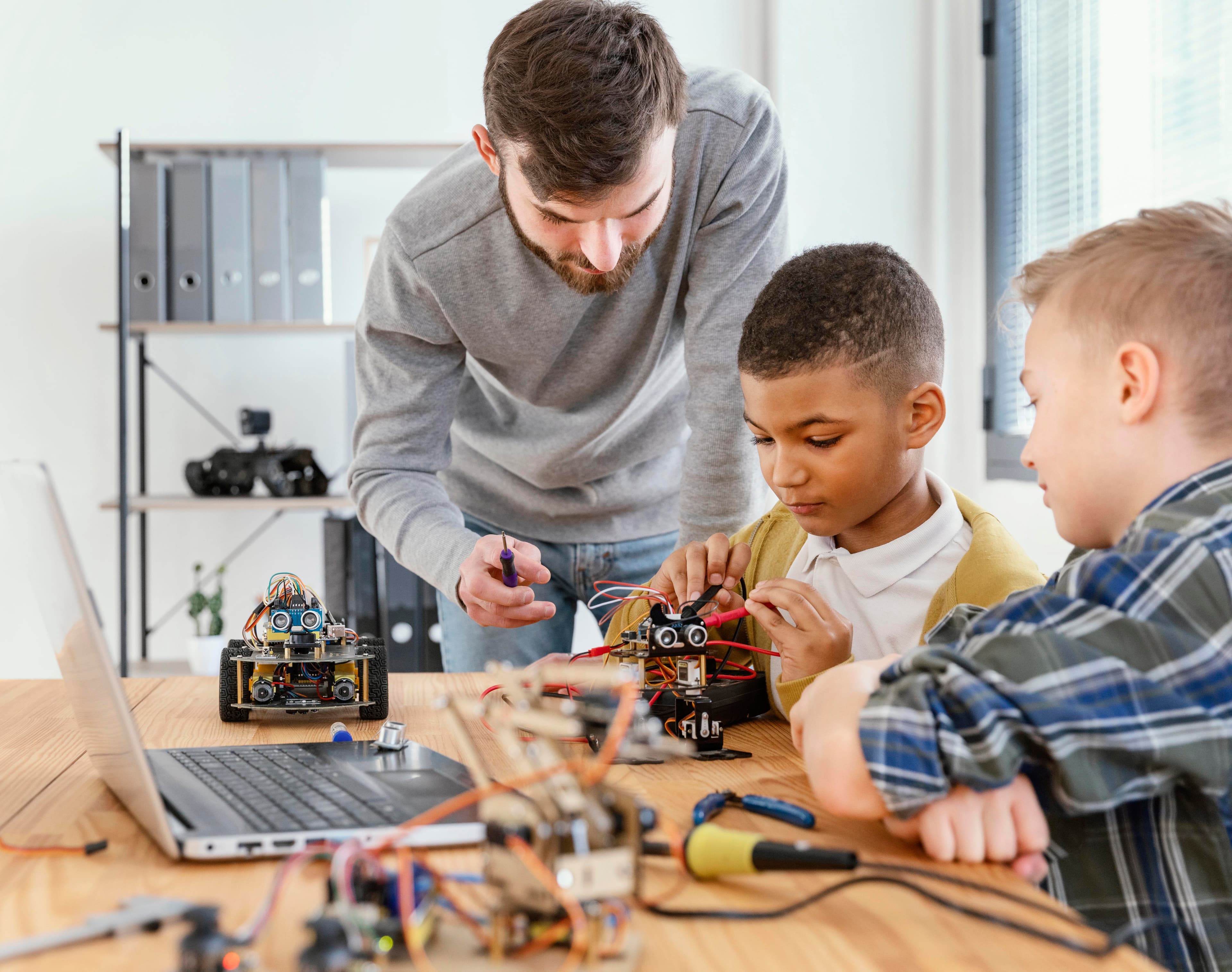 Students learning robotics and coding with RoboCoders
